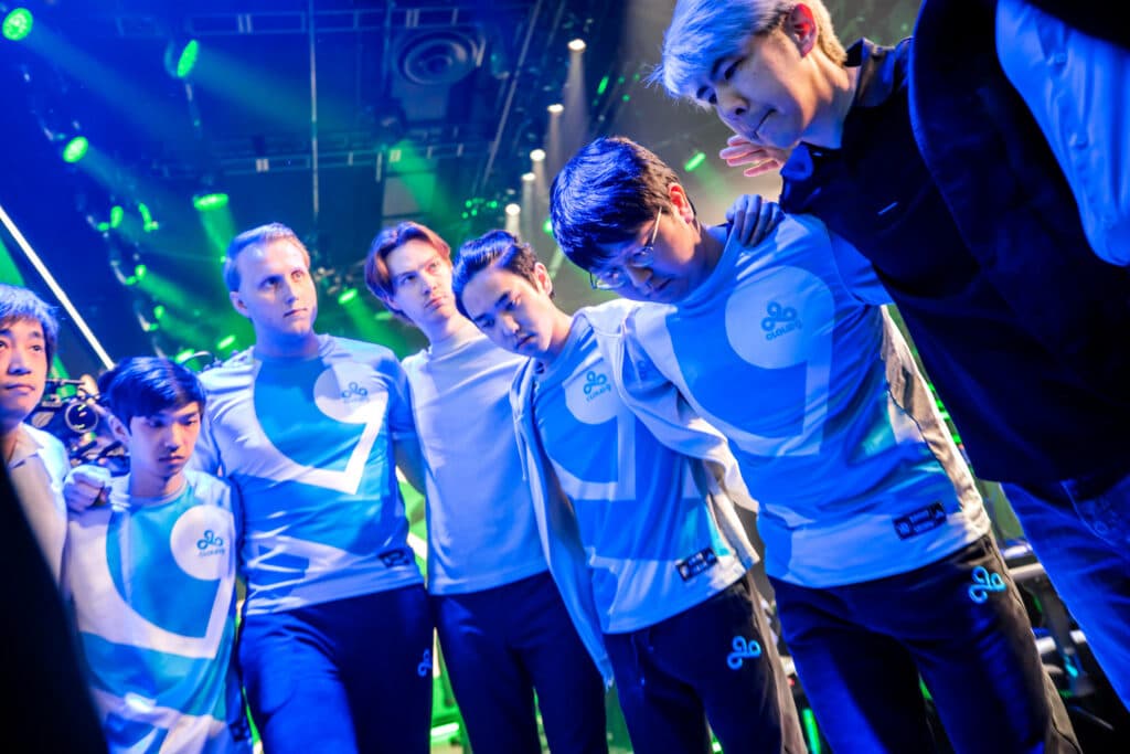 Cloud9 huddles onstage before competing during the Playoffs of the 2023 LCS Spring Split at the Riot Games Arena on March 30, 2023. (Photo by Colin Young-Wolff/Riot Games)