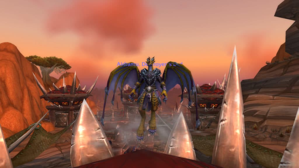 <em>A bronze-tinged Dracthyr above Orgrimmar. </em>