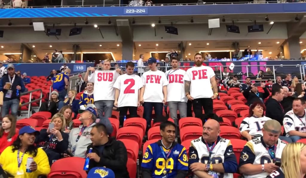 MrBeast and his friends at the Super Bowl advertising for Subscribe to PewDiePie.