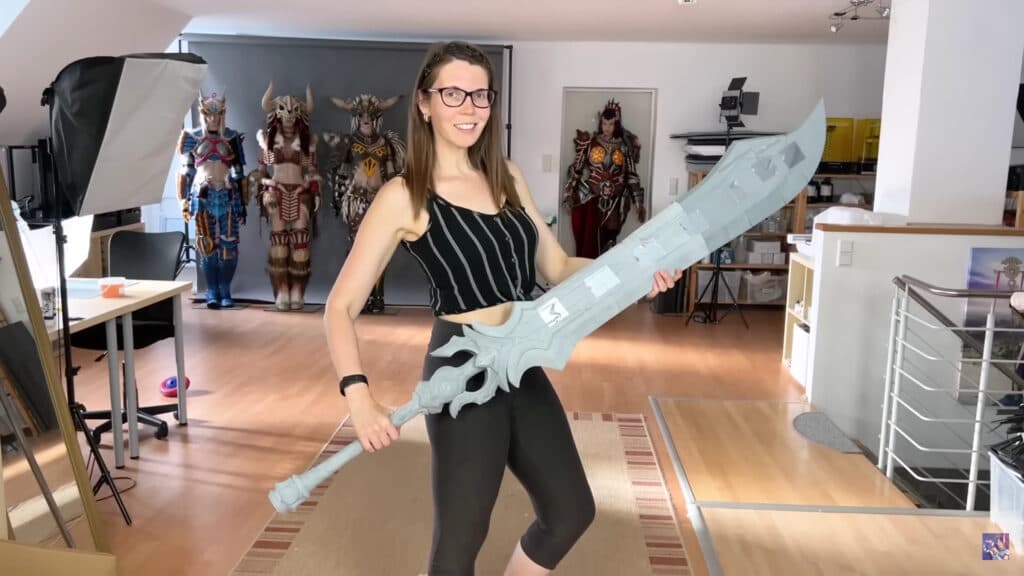 The assembled pieces of a giant sword from Genshin Impact (Image from <a href="https://www.youtube.com/watch?v=Xhl5oUL5g3c" target="_blank" rel="noreferrer noopener">KamuiCosplay</a>)