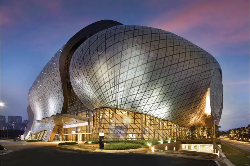 MITEC Kuala Lumpur from outside.<br>(Image from <a href="https://mys.sika.com/en/project-references/local-projects/malaysia-international-trade-and-exhibition-centre-mitec.html" target="_blank" rel="noreferrer noopener nofollow">mys.sika.com</a>)