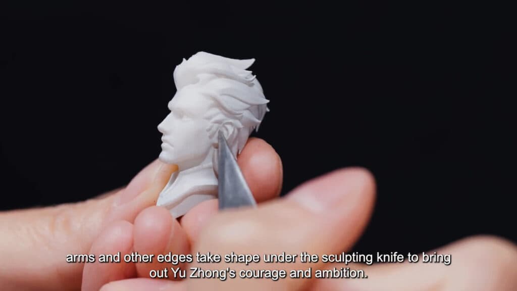 The Yu Zhong Cosmic Dragon figurine sculpting process.<br>(Image via Moonton)