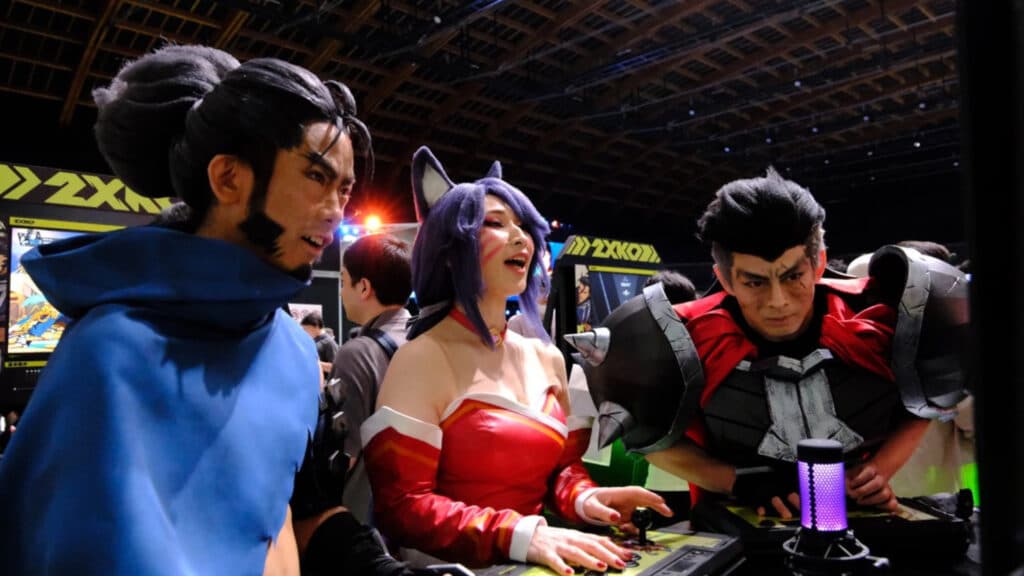 Cosplayers playing 2XKO at Evo Japan 2024 (Image via Riot Games)