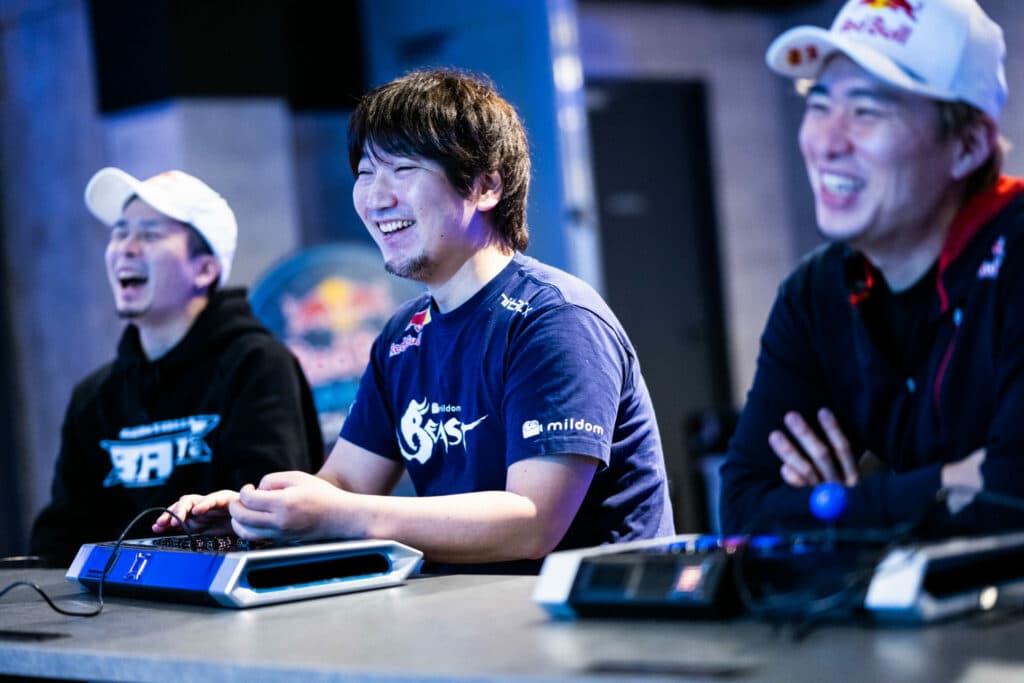 Tsunehiro "gachikun" Kanamori, Daigo, and Bonchan playing Street Fighter 6 (Image via Jason Halayko and Red Bull Content Pool)