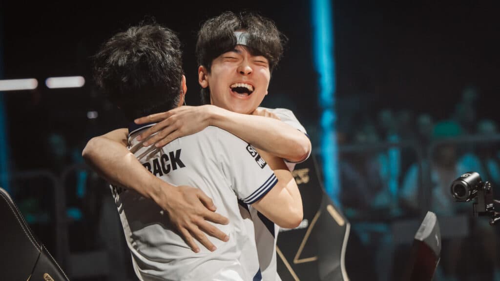 DRX BeYn and Flashback hugging after the team’s Playoffs qualification (Image by Colin Young Wolff/Riot Games)