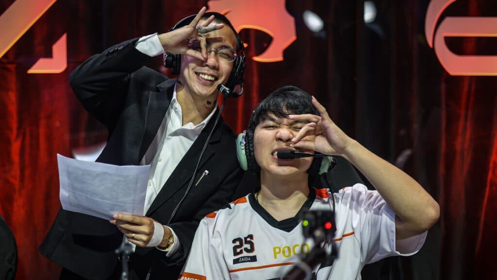 Coach Hito and Jungler Zaida pose for the camera. (Photo via MOONTON Games, MPL Philippines)