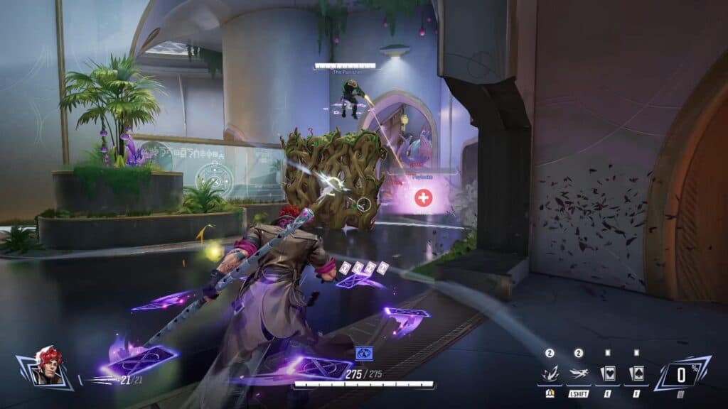 The revolving cards around Gambit and his ally Punisher denote his ult's buff is active in Marvel Rivals (Image via NetEase Games)