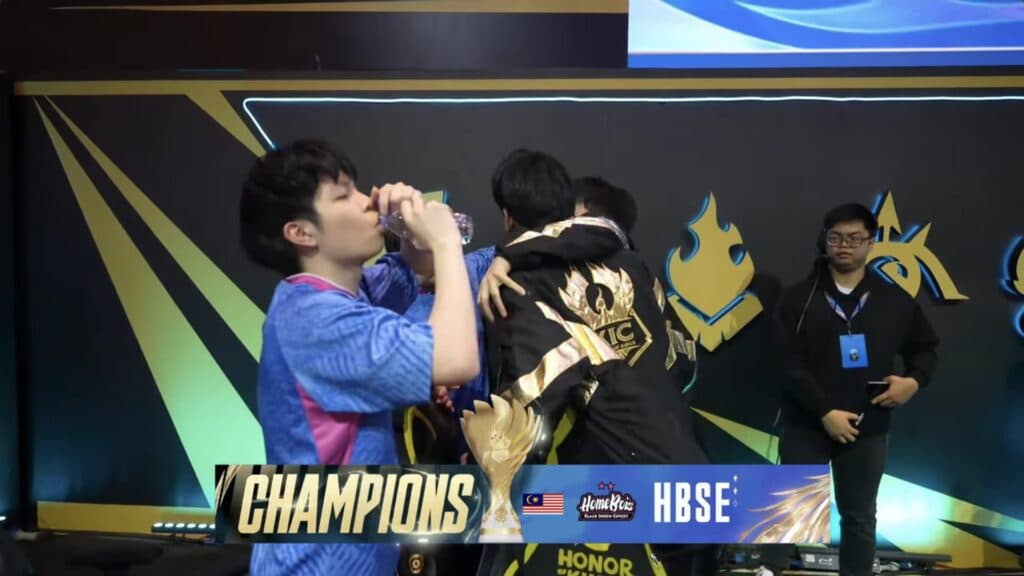 HomeBois celebrating their Grand Finals win. (Image via Honor of Kings YouTube)