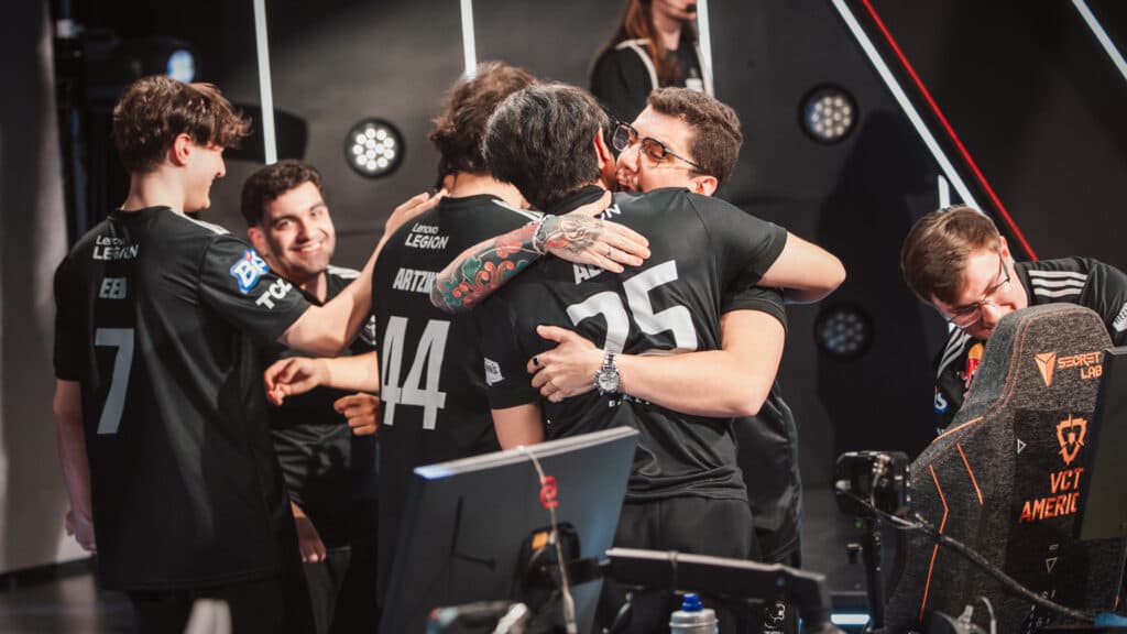 Coach shaW hugs artzin after their victory over G2 (Image by Colin Young-Wolff/Riot Games)
