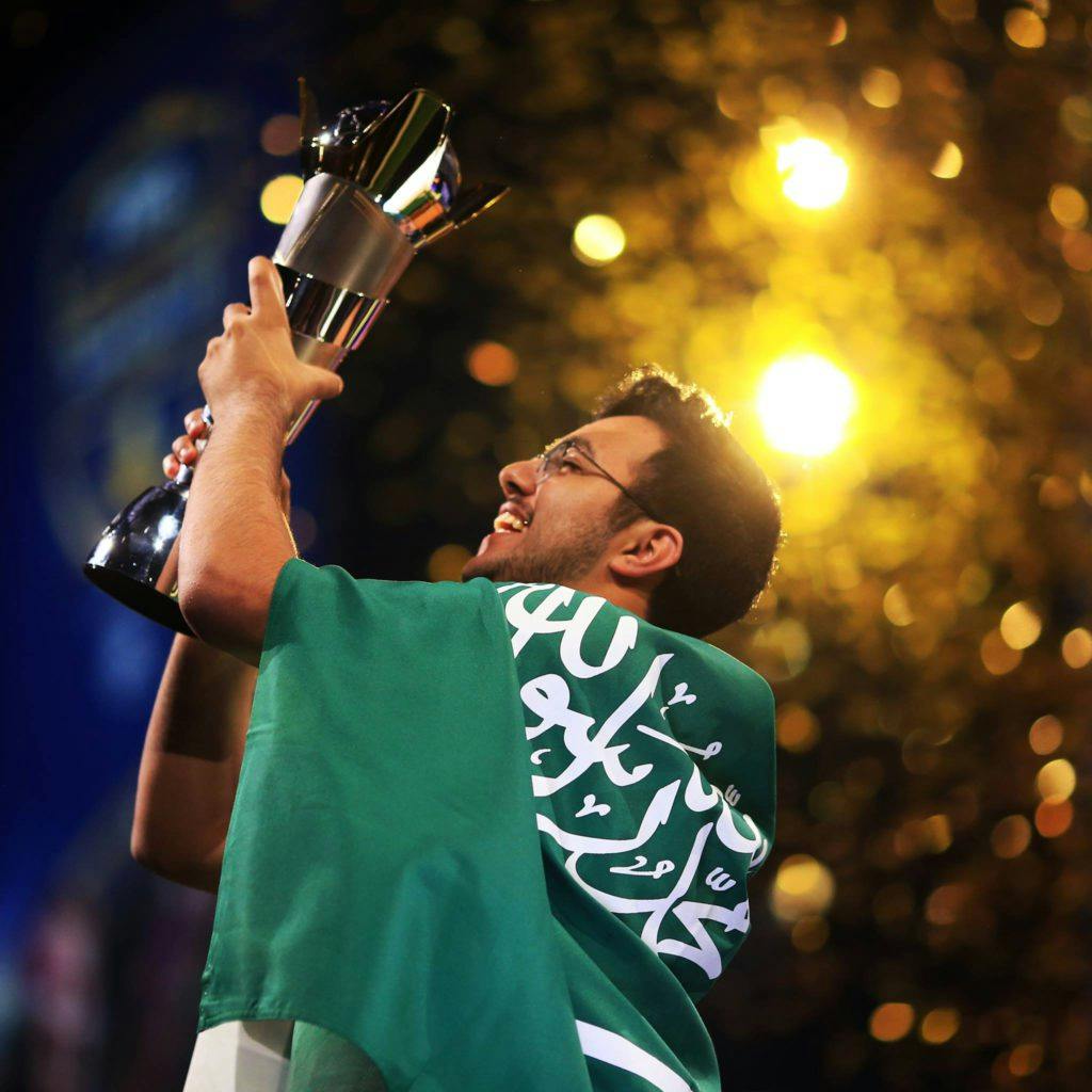 Msdossary lifting the World Cup trophy in 2018. Image via FIFA.