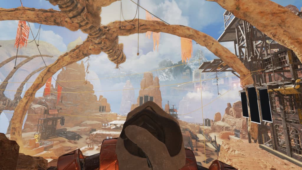 A giant skeletal structure looms over the firing range, which now has a different skybox than the usual one