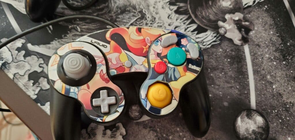 Image via Dabuz | This is Dabuz' most current controller, which has a custom designed skin over it featuring his favorite Ultimate fighters