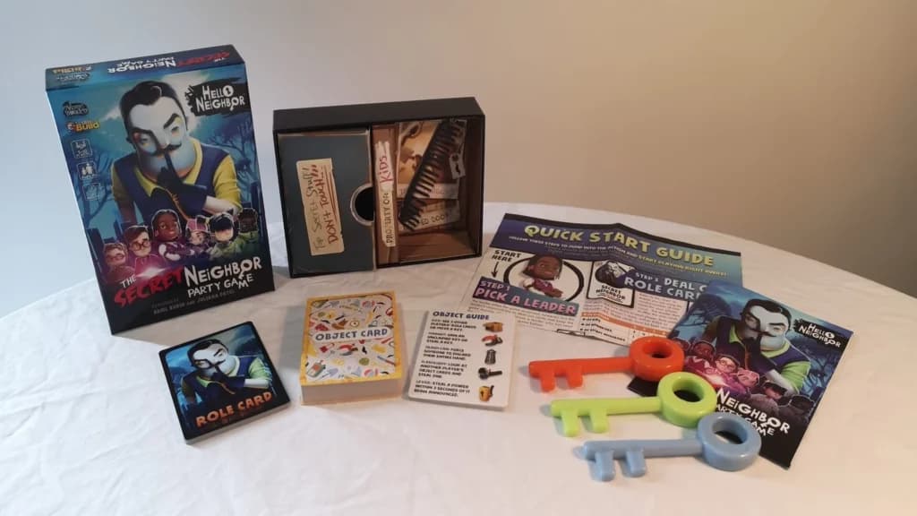 Secret Neighbor board game assets. Photo via <a href="https://www.google.com/url?sa=i&url=https%3A%2F%2Ftechraptor.net%2Ftabletop%2Ffeatures%2Fvideo-to-tabletop-secret-neighbor-party-game&psig=AOvVaw18N74qmMA2IfTgUCIGvhtW&ust=1682442456597000&source=images&cd=vfe&ved=0CBIQjhxqFwoTCPi4wtyAw_4CFQAAAAAdAAAAABAJ">TechRaptor.</a>