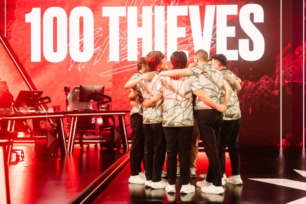 100 Thieves did not know this would be their last pre-game huddle as a group of five. (Photo by Colin Young-Wolff/Riot Games)