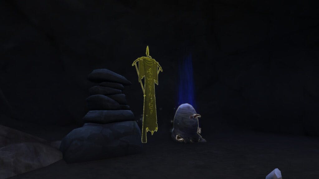 <em>The Deadsnare Caverns burial marker in the Secrets of Azeroth Pinewood Post quest chain.</em>