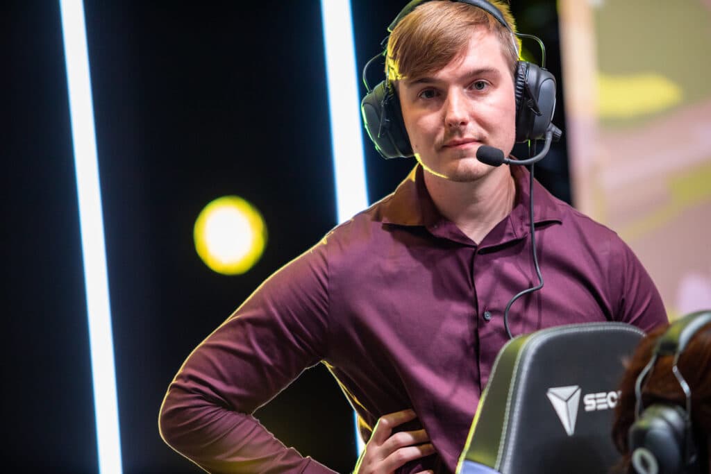 Coach Mabrey on stage (Image via Riot Games)