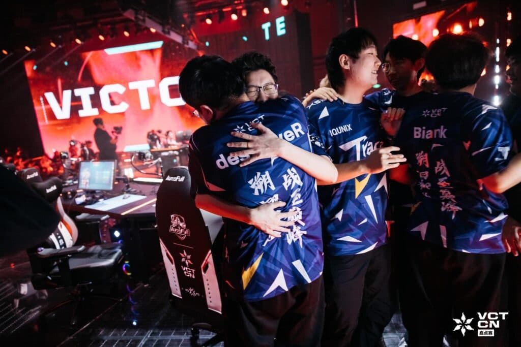 Trace Esports celebrating their win on-stage. (Photo via VCT CN / Riot Games)