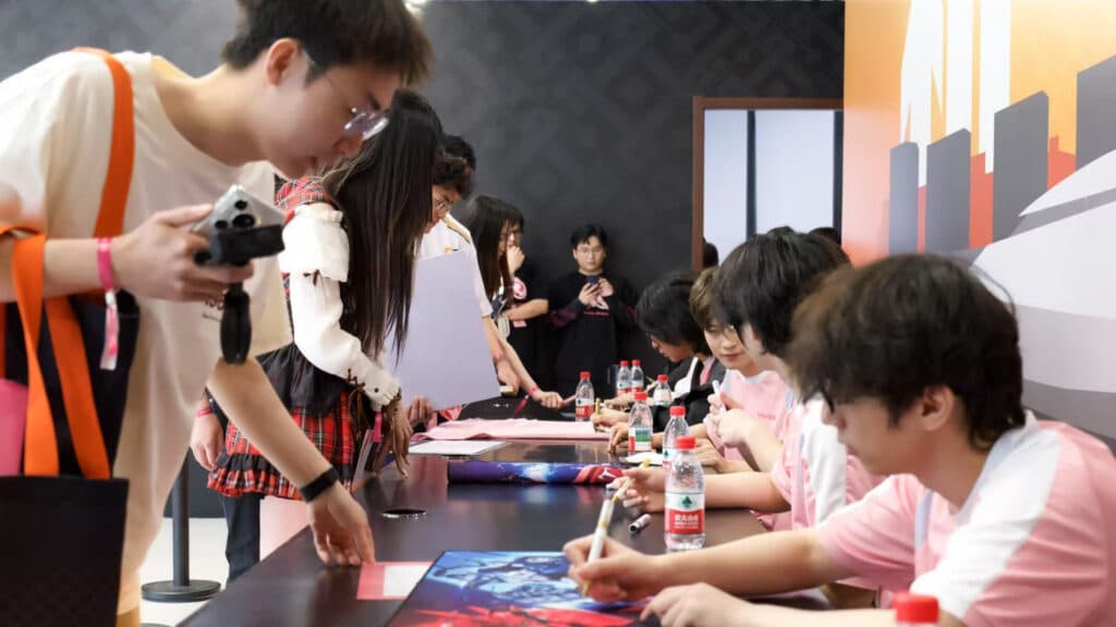 Once Again players interacting with fans and supporters at the Hangzhou Major (Image via Once Again Esports)