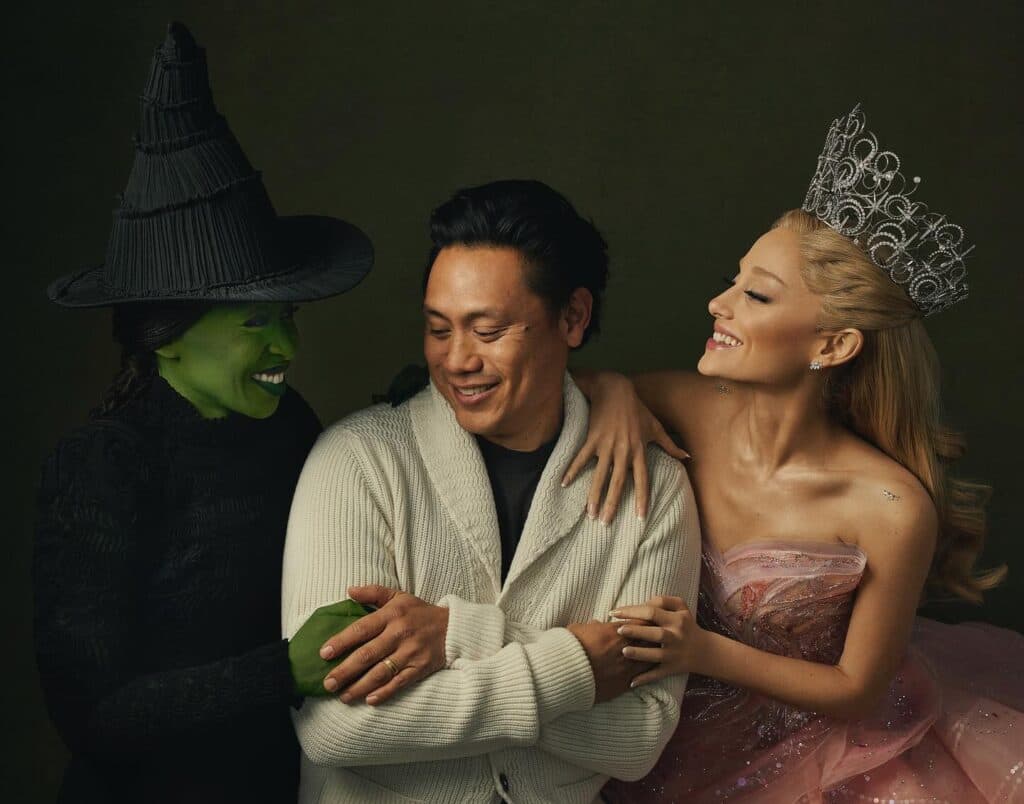 Cynthia Erivo as Elphaba (L), director Jon M. Chu, and Ariana Grande as Glinda (Photo via Instagram/jonmchu)