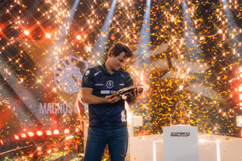 GM Magnus Carlsen took the championship at the EWC25 Chess event (Photo via Esports World Cup)