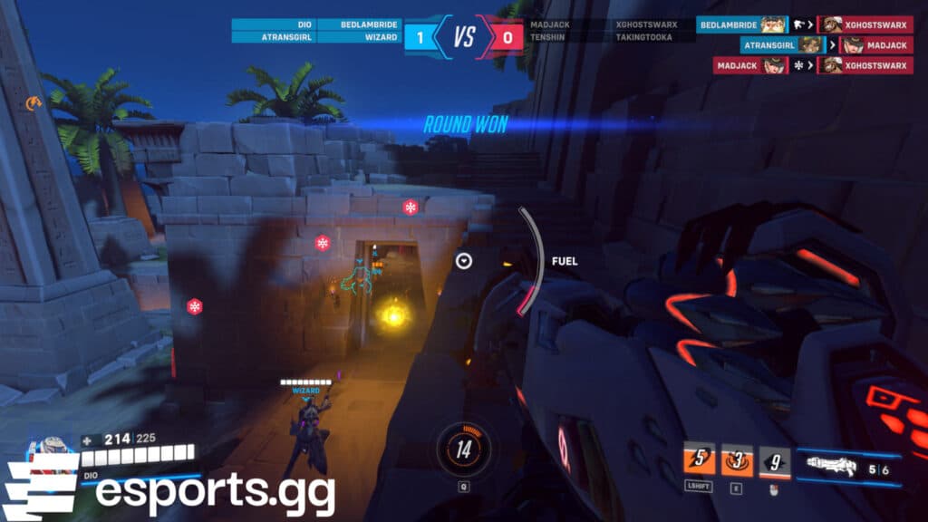 Pharah taking the high ground while Moira sends a healing orb into the cave (Screenshot via esports.gg)