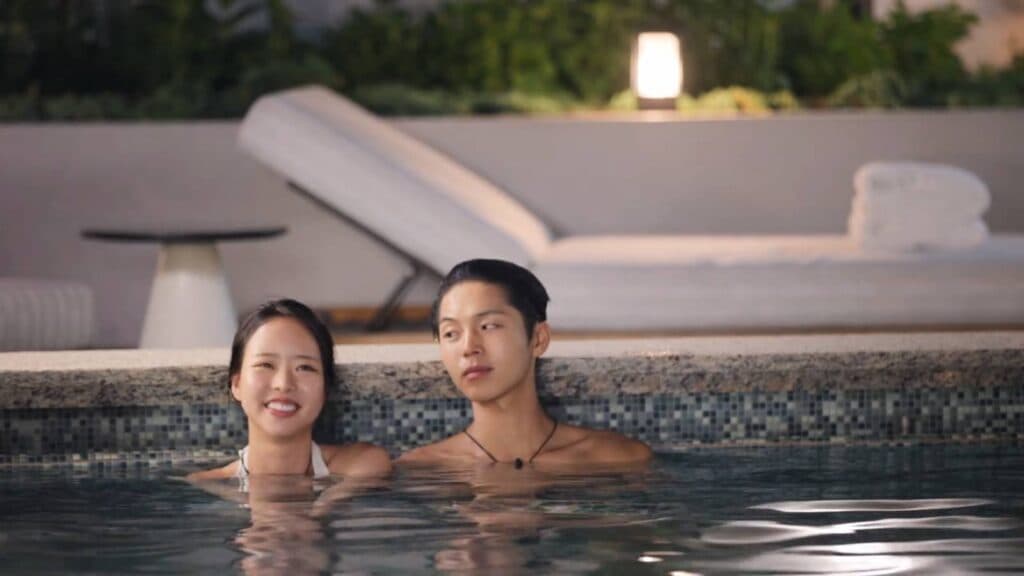 Park Hee-sun and Lim Su-been in a pool (Image via Netflix)
