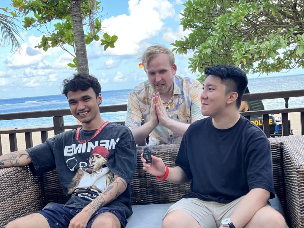 TeaGuvnor creating content with Team Indonesia's Womy and Whitemon at IESF 14th World Esports Championship Bali 2022